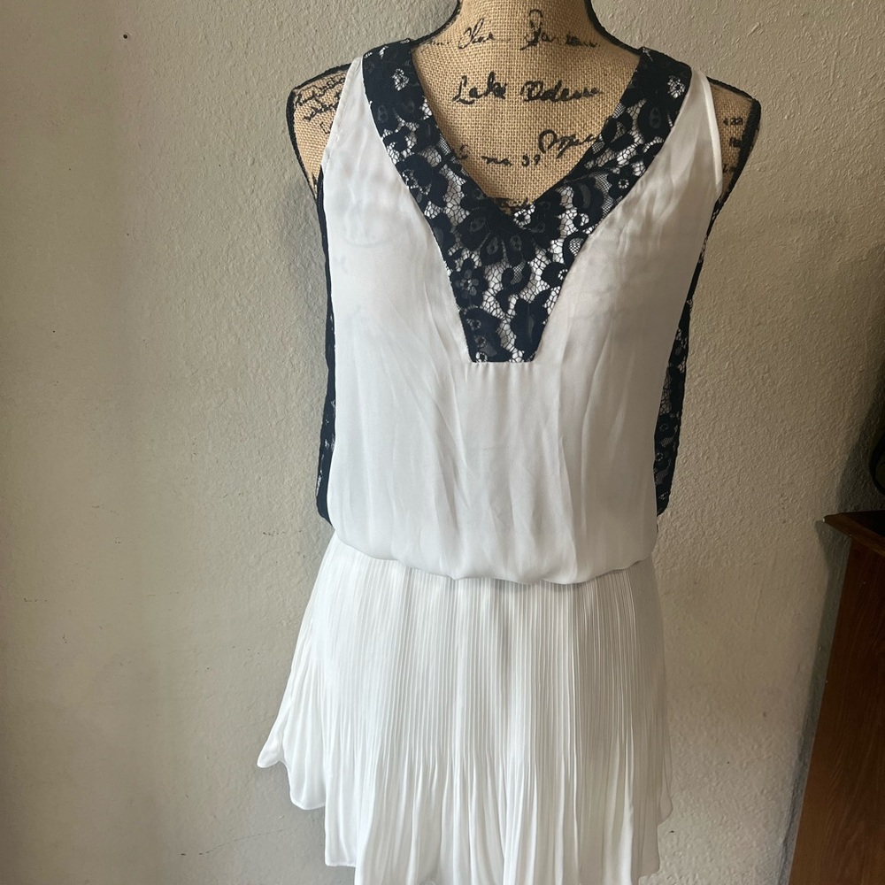 Costume clothing  White and Black Sleeveless Dress with Lace Detail